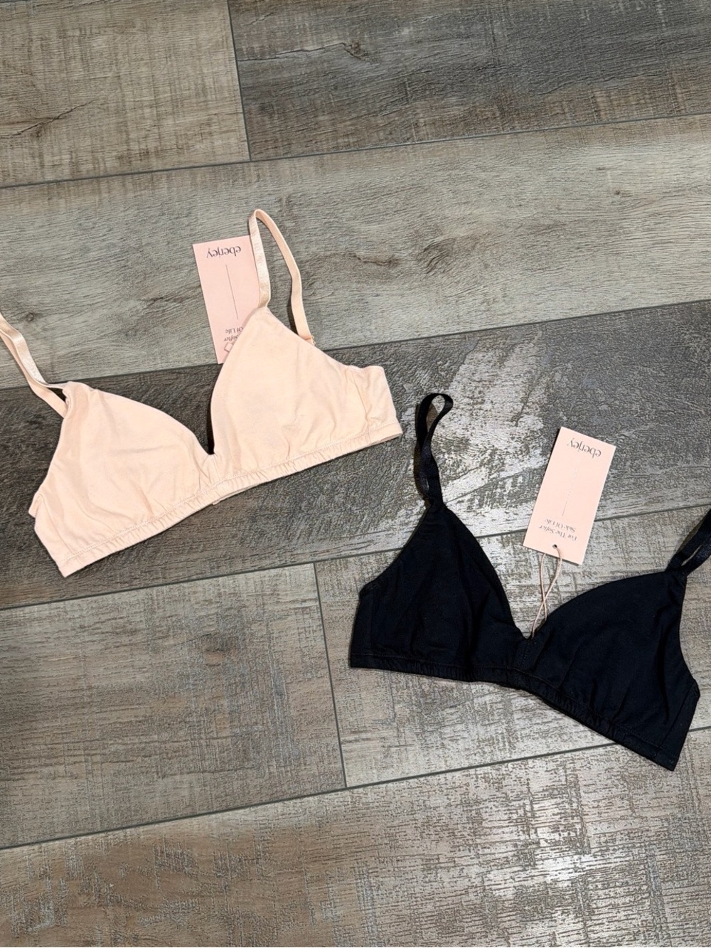 Eberjey Pima stretch cotton bralettes in buff and black